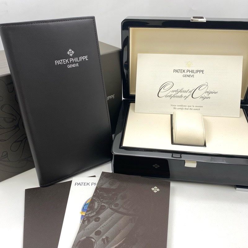 Patek Philippe 5164A-001 Aquanaut Travel Time Warranty 2016